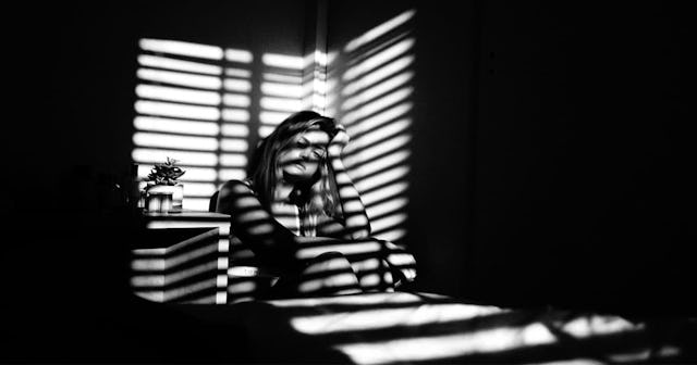 Woman that wasn't emotionally safe sitting inside the house