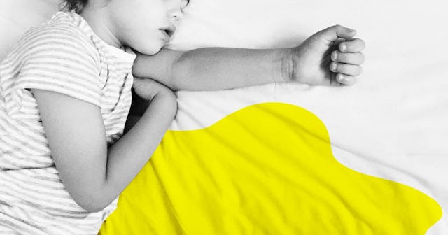 Toddler Sleeping Next To A Big Yellow Stain After He Wet The Bed