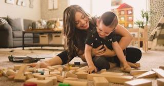 A stay-at-home mom playing with her son