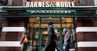 Barnes and Noble diverse book covers: Three people walking in front of a Barnes & Noble bookstore in...