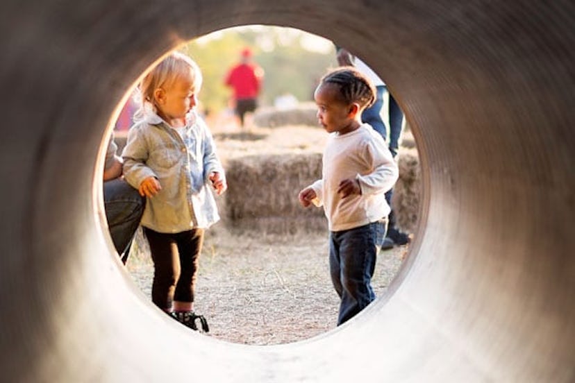 A Trip To The Park Reminded Me That My Black Children Aren't Safe: Kids playing in a tunnel