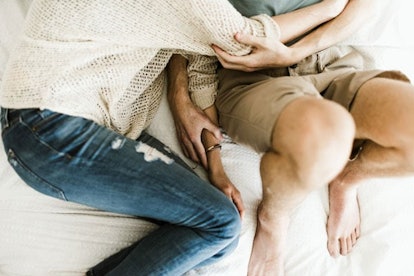 Dating Is Even More Complicated As A Widow: man and woman cuddling in bed