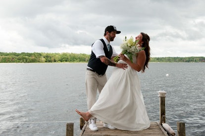 What Falling in a River on my Wedding Day Taught me About Motherhood: Groom dipping bride for photog...
