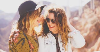 two women laughing in the sun