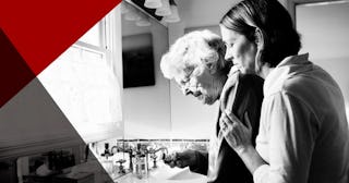 Daughter and Elderly mother checking medicine