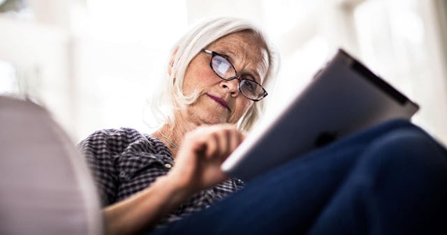 senior woman using tablet