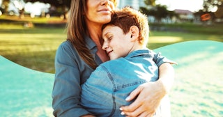 teenager embraced with mom consoling her son