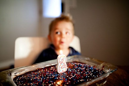 The Dreaded Birthday Party When You Have A Sensitive Child: toddler boy blows out his birthday candl...