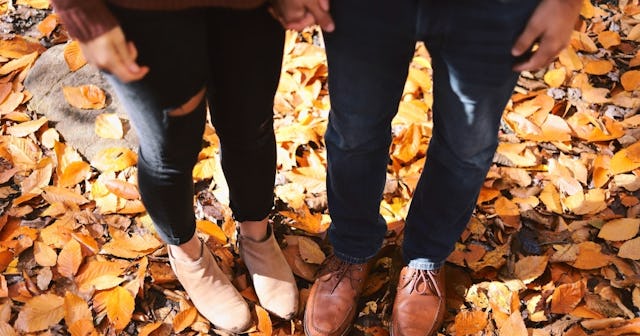 fall date ideas, Couple in autumn leaves