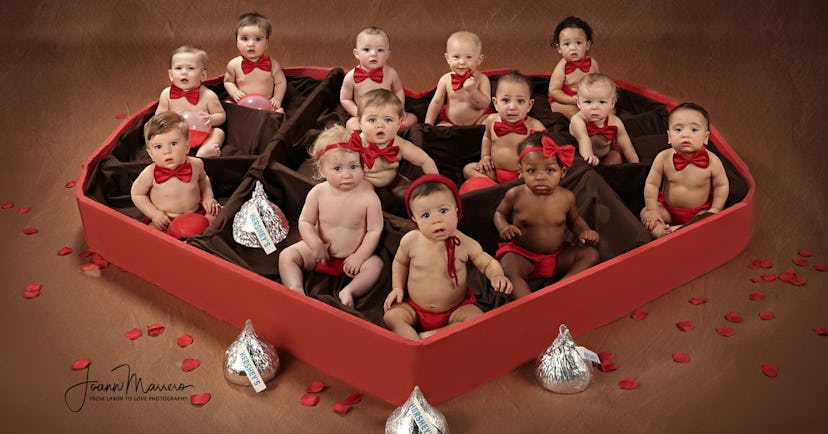 Babies in heart shaped chocolate box