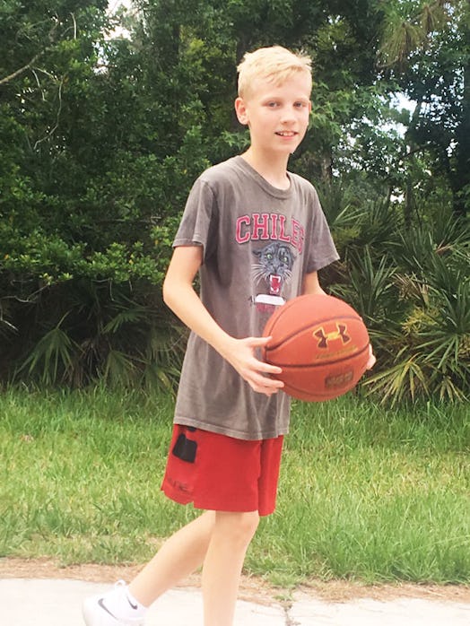 Boy Playing basketball