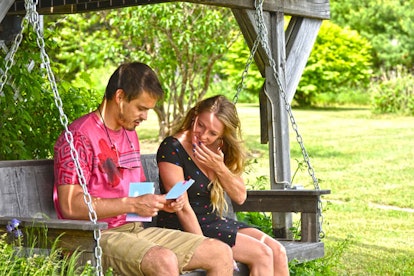 How To Do A Baby Shower With A Sex/Gender Reveal That Doesn’t Suck: Man and Woman Sitting on a Swing...