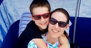 Mom and son posing with sunglasses on