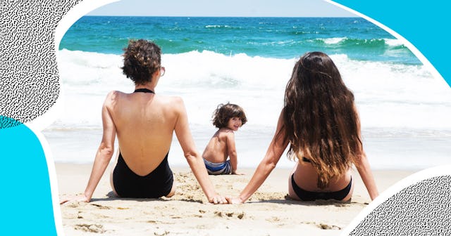 Why You Might Want to Pack Up Move Near The Water: two women watch their child playing on beach