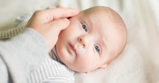 parental leave in finland: mother touching baby face