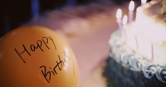 Birthday cake and balloon