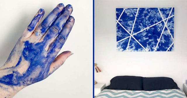 I Had Sex On A Canvas And Made Art: hand covered in paint and canvas on wall