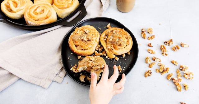 tree nut allergy, child touching pastry with nuts