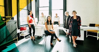 Further Proof That Women Should Be In Charge: Group portrait of businesswomen in creative office