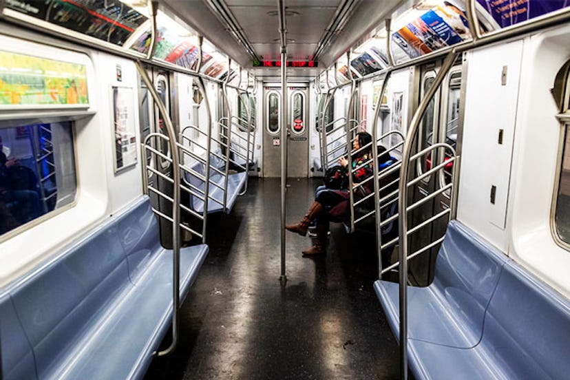 Commuters ride through the Union Square subway station on March 17, 2020 in New York City. A day aft...