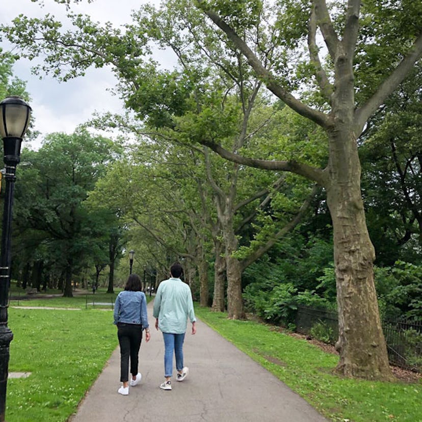 Mother and son walking at college