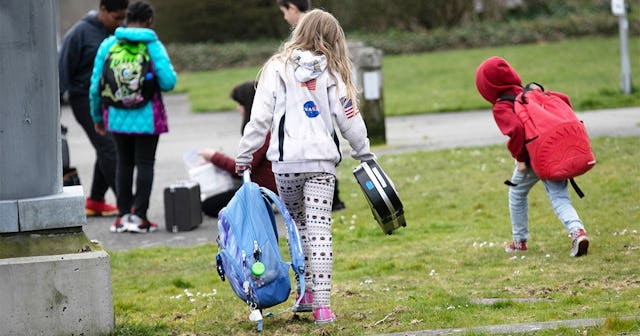 Students leave the Thurgood Marshal Elementary school after the Seattle Public School system was abr...