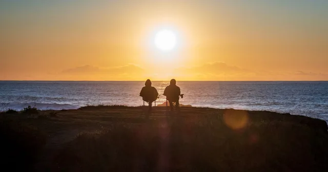 retirement planning, Older couple at sunset