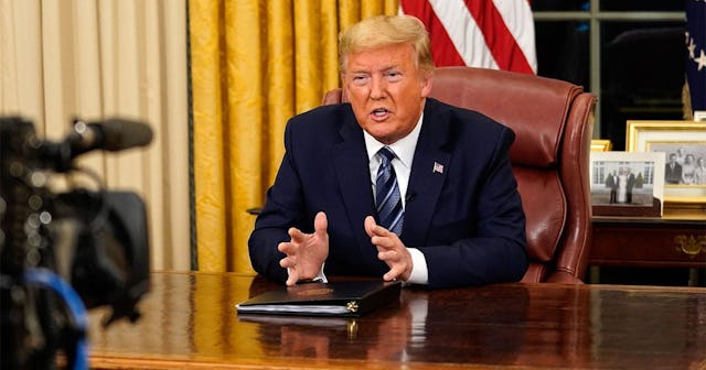 US President Donald Trump addresses the Nation from the Oval Office about the widening novel coronav...