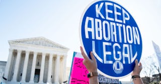 Pro-choice activists supporting legal access to abortion protest during a demonstration outside the ...