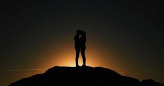 sex poems, Couple posing on a hill at sunset