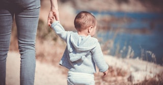 open adoption, person holding hands with a toddler