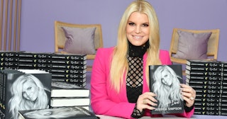 Jessica Simpson poses with her book