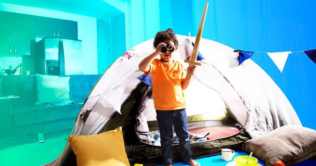 Young boy has adventure indoors