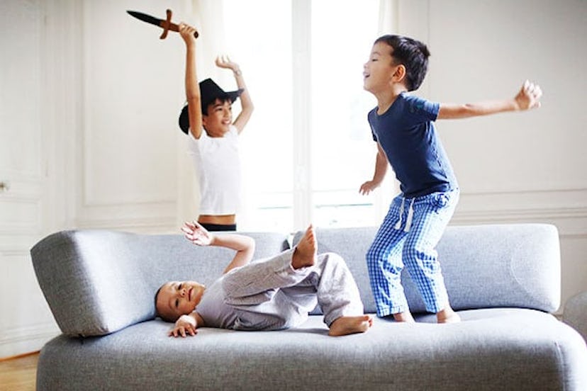 3 brothers playing in the living room