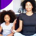 Mindful mom with kid daughter doing yoga together