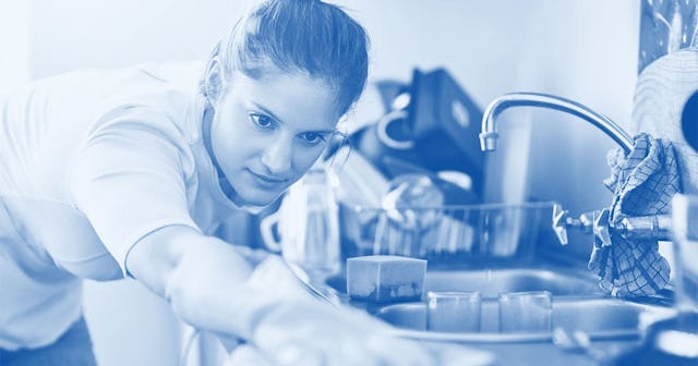 Cropped shot of a young woman cleaning her home