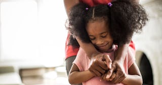 mother's arms embracing daughter