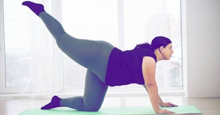 woman training legs and loin during workout
