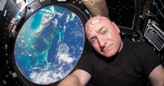 ASA astronaut Scott Kelly is seen inside the Cupola, a special module which provides a 360-degree vi...