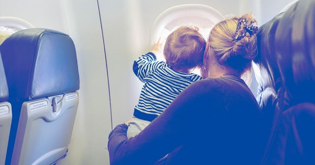 mother and baby looking out airplane window