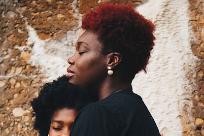 mom hugging daughter