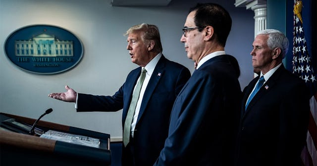 President Donald J. Trump listens as Treasury Secretary Steven Mnuchin announced that the IRS would ...