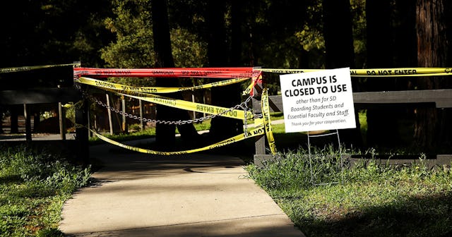 Signs outside San Domenico private school show that the school has closed its campus to outside visi...