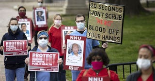 Nurse's Protest Outside White House For Better Safety Standards And Mass Production Of PPE During CO...