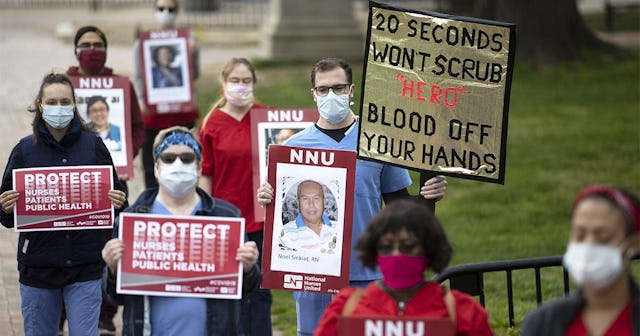 Nurse's Protest Outside White House For Better Safety Standards And Mass Production Of PPE During CO...