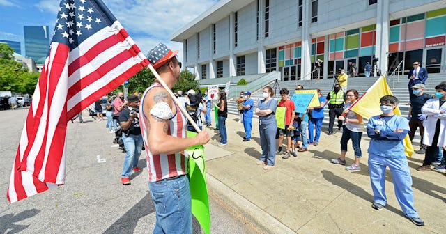 Protesters from a grassroots organization called REOPEN NC gather for pressure North Carolina Govern...