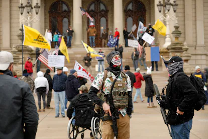 Photos Show Big Crowds Protesting Coronavirus Lockdowns At State Capitols