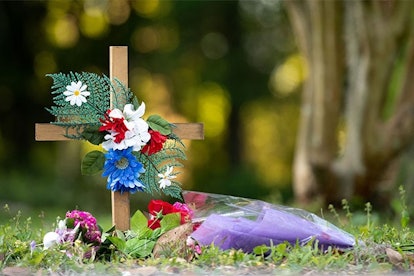 A cross with flowers sits near the intersection of Satilla Rd. and Holmes Rd. in the Satilla Shores ...