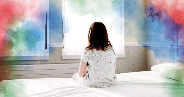 Girl sitting on hospital bed