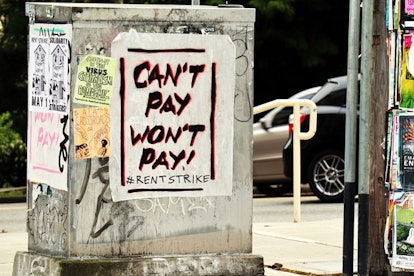A utility box in Seattle's Capitol Hill neighbourhood is covered in graffiti and posters calling for...